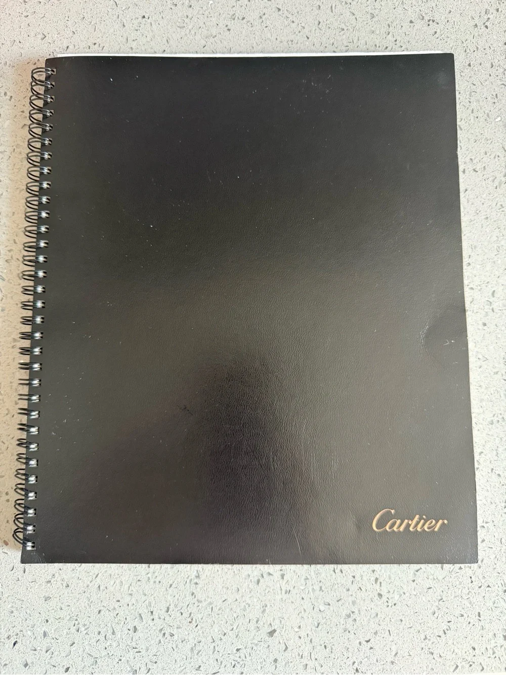 Cartier Black Notebook with Gold Logo